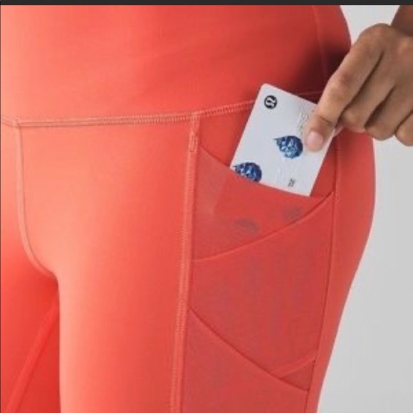 Lululemon Rise and Flow legging in Cape Red coral color with pockets, high rise! - Picture 3 of 9
